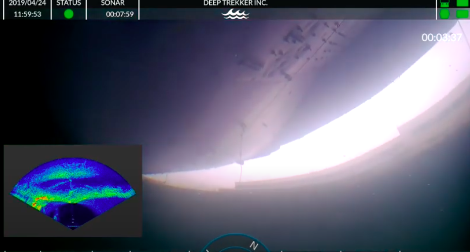 View from screen of DTG3 equipped with sonar. Underwater looking at ship hull. 