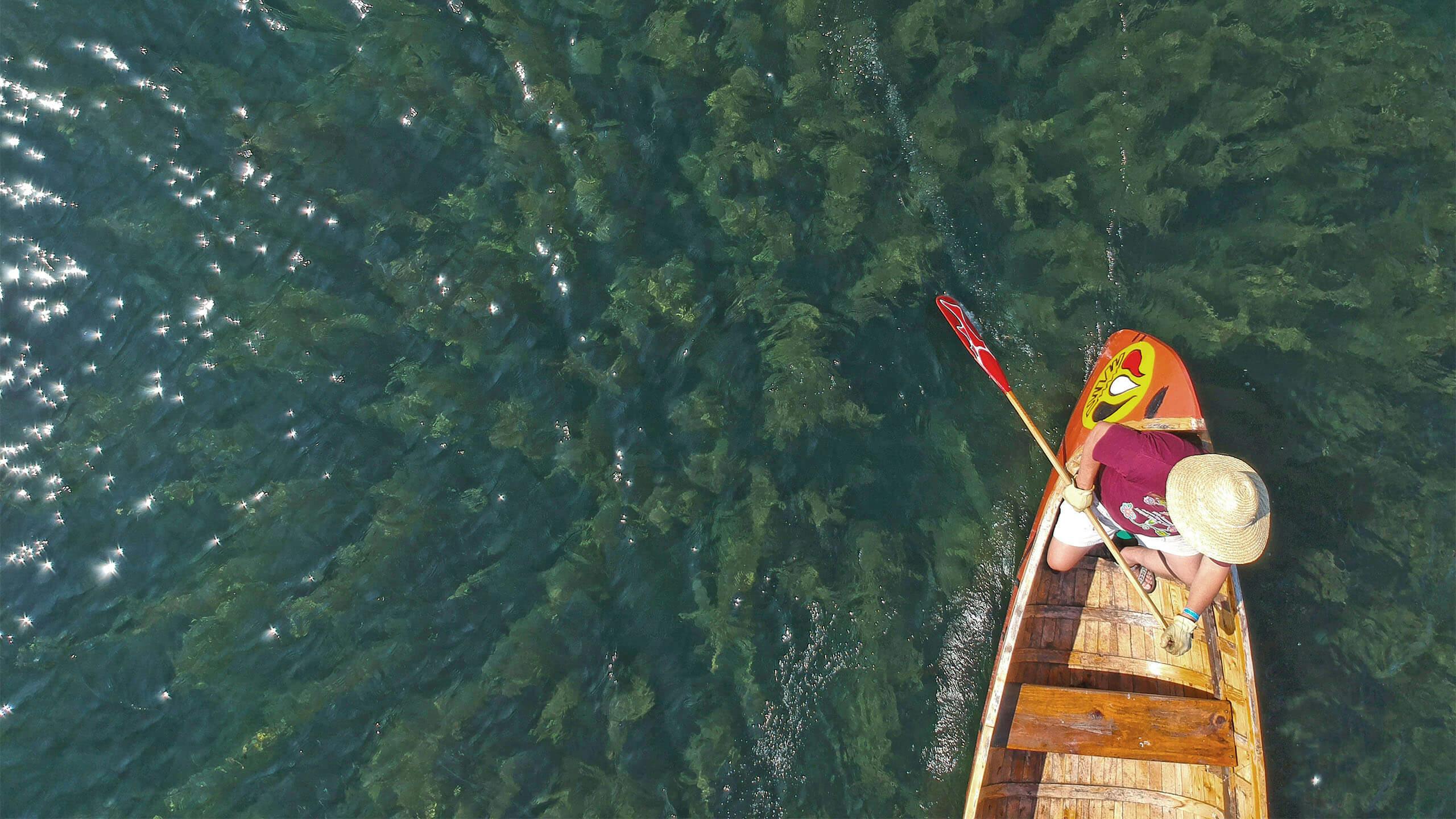 Aerial shot of man in a canoe on the Straits of Makinac