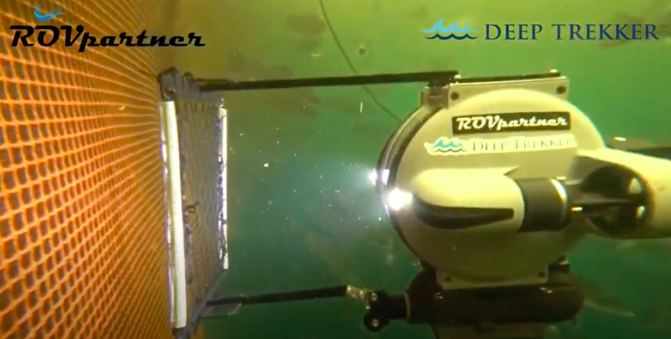 DTG3 ROV patching a net underwater at a fish farm 