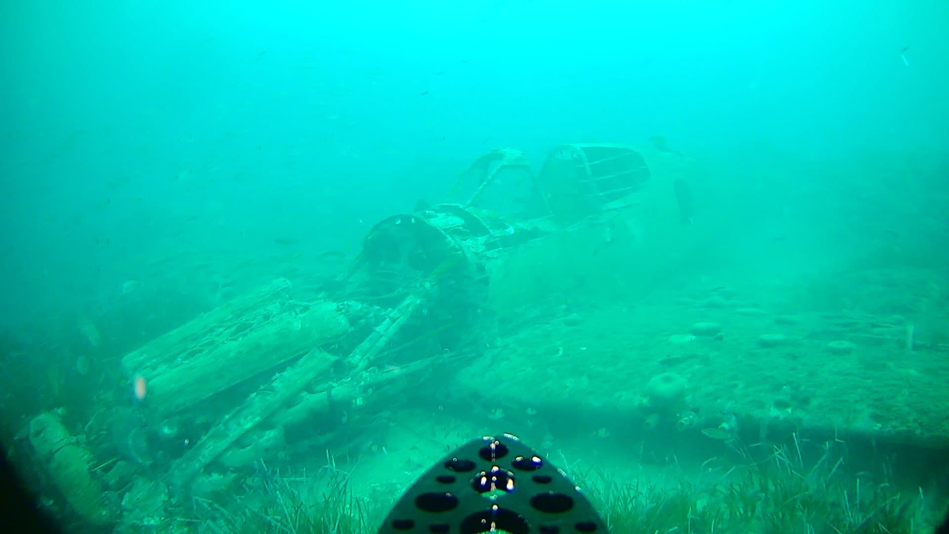 Plane underwater being approached by Deep Trekker DTG3 ROV